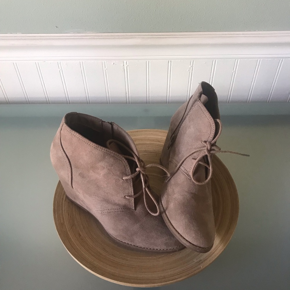 Light brown wedge boots size 8.